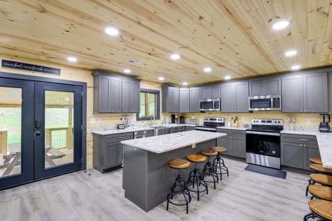 Sevierville Vacation Rental | 8BR | 8BA | 4,000 Sq Ft | Stairs Required