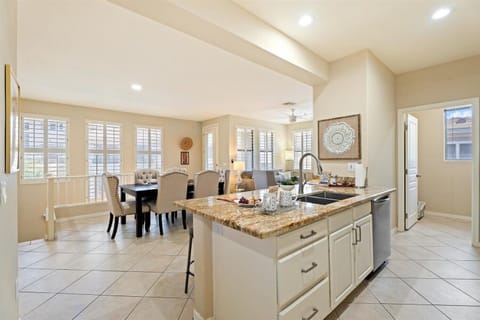 Beautiful natural light flows through the home's main living area, designed for both relaxation and connection