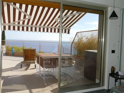 Property, Furniture, Sky, Building, Shade, Wood, Door, Chair, Interior Design, Table