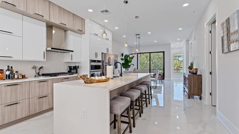 Townhome, 4 Bedrooms | Private kitchen | Fridge, oven, coffee/tea maker, toaster