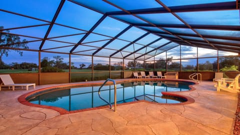 Enjoy pool/spas time with golf course view