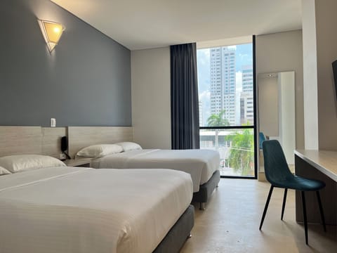 Rilux Twin Vista a la Ciudad | Premium bedding, down comforters, pillowtop beds, minibar