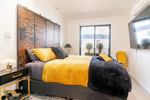 main bedroom with blackout roller blinds 