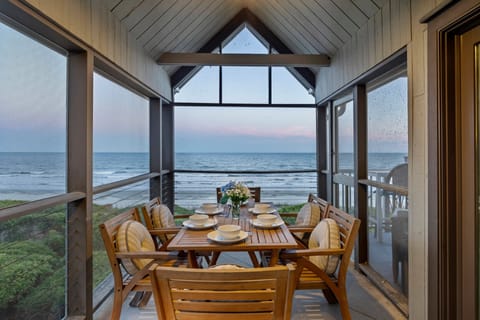 Enjoy the screened porch with views of the beach. Amazing oceanfront condo that is fully renovated!