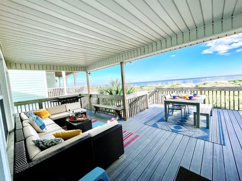 Huge covered porch for those rainy beach days or when you just want to lay and listen to the waves crash