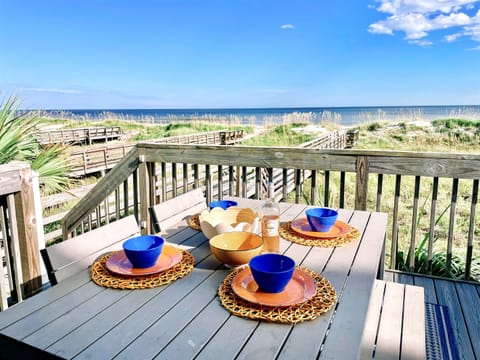 Dining al fresco with the sound of the crashing waves