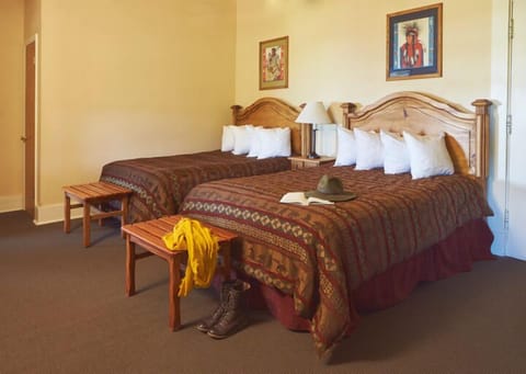 Desk, iron/ironing board, free cribs/infant beds