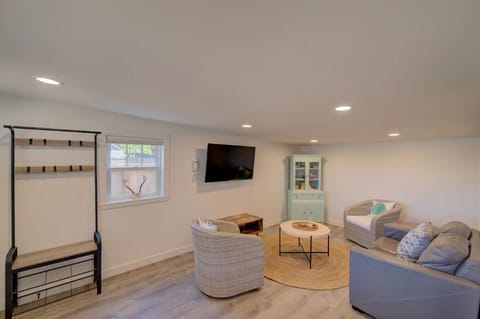 Spacious living room with seating for four