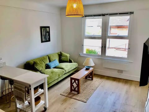 front open plan room, velvet sofa 