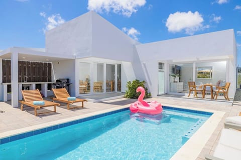 You will enjoy swimming in the pool while basking in the sun.