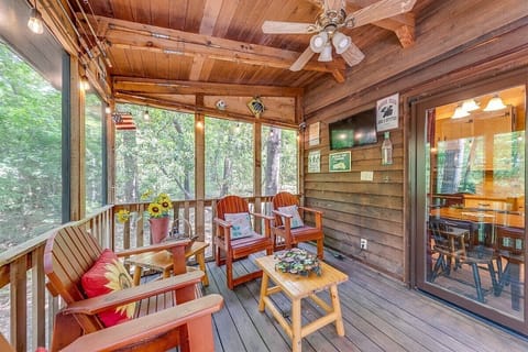 Relax on the cozy porch and watch tv or enjoy nature