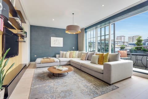 Spacious, light-filled, open plan living room with a south facing terrace