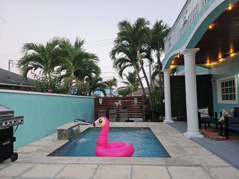 Backyard Pool with Waterfall with Patio and Propane BBQ Grill