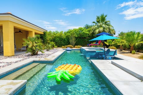 Outdoor pool, pool umbrellas, sun loungers