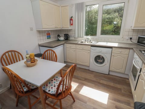 Fridge, electric kettle, toaster, cookware/dishes/utensils