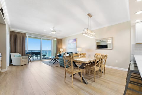 Relax in your open-concept living space where ocean breezes flow through and stunning sea views create the perfect backdrop for memorable meals.
