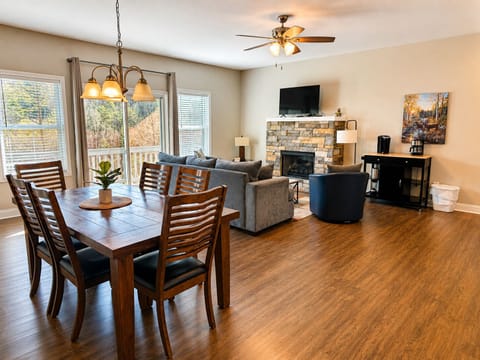 Gather, unwind, and make yourself at home in this warm and inviting mountain retreat — featuring an open-concept living space, cozy stone fireplace, and plenty of room for relaxing after a day exploring North Georgia.