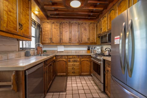 Fully stocked Kitchen with stainless steel appliances