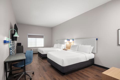 Premium bedding, down comforters, in-room safe, desk