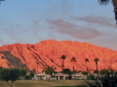 Sunrise from the patio, mountains are  ablaze with color. Perfect moments await.