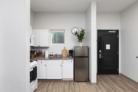 Fully-stocked kitchen off of the dining area with everything you'll need to cook and make yourself at home.