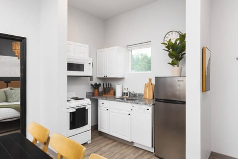 Fully-stocked kitchen off of the dining area with everything you'll need to cook and make yourself at home.