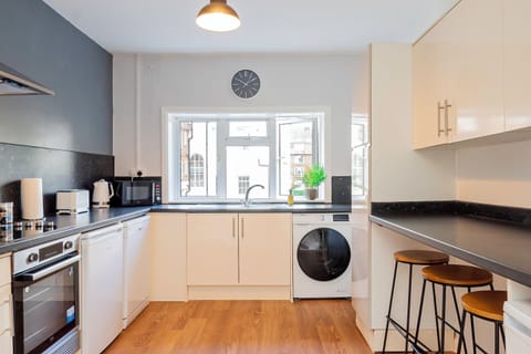 The spacious countertops provide ample space for meal preparation,