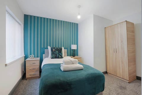 Bedroom 1 benefits from a comfortable single-sized bed with plenty of storage.