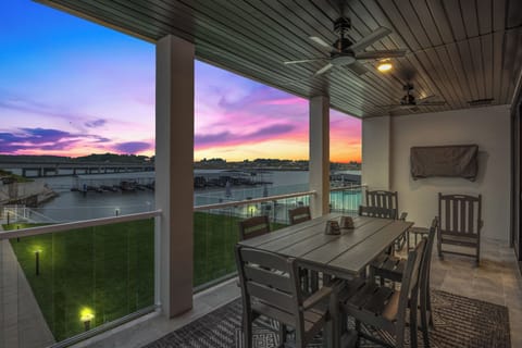 Enjoy the spacious covered patio and stunning water sunset views - perfect for relaxing!