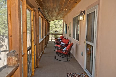 Screened Porch with Rocking Chairs (1)