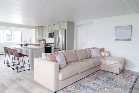 The open, spacious first floor is perfect for gathering with your crew.