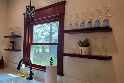 Enjoy some wine after a long day of sightseeing and prepare a meal in this fully equipped kitchen.