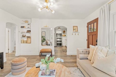 Arched doorway leads into the recently renovated designer kitchen. 