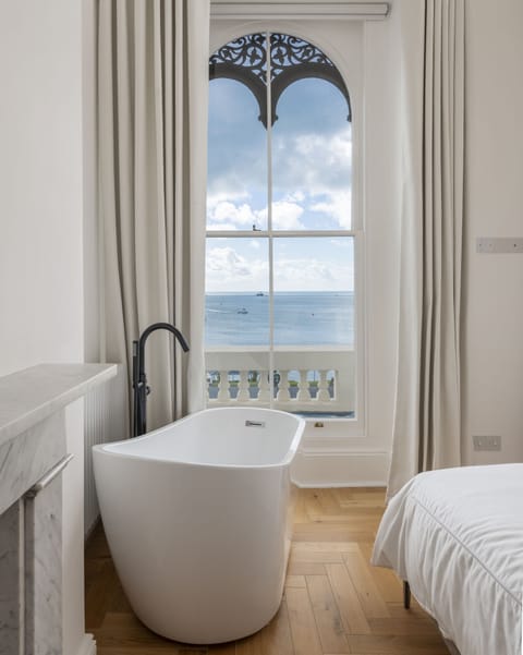 Presidential Apartment | Premium bedding, down comforters, individually decorated