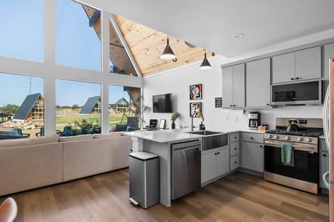 Kitchen stocked with cooking supplies and coffee