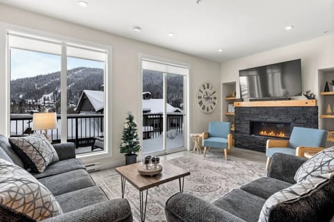 The main living space has a 65 inch smart tv and a bluetooth sound bar. Guests can connect to it and listen to music while enjoying some family and friend time in the cozy setting by the gas fire place. 