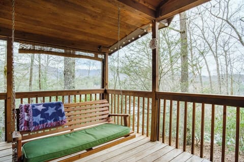 Winter mountain view with porch swing, perfect for your morning cup of coffee!