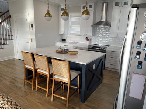 Stocked Gourmet Kitchen in Open Concept Family/Dinning room w/ full deck access