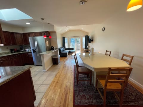 Kitchen, Dining room and Living room picture taken from end of dining room