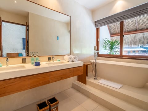 IZE Suite | Bathroom | Eco-friendly toiletries, hair dryer, bathrobes, slippers