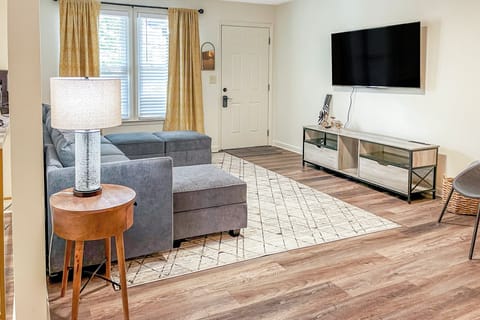 Large Living room and dining area with smart TV