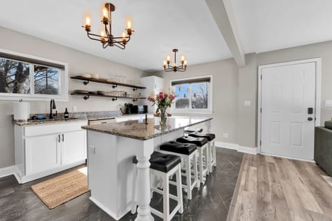 6 seating arrangements around oversized Granite Counters for Dining Experience