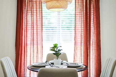 Dining Area - Enjoy your meals while looking at the birds visiting the trees in the backyard.