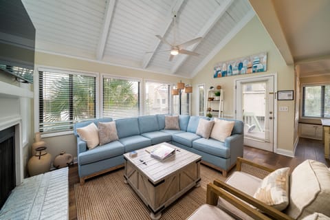 Cathedral ceilings, new wood flooring & an open floor plan create an inviting space.