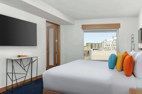 Premium bedding, down comforters, in-room safe, desk