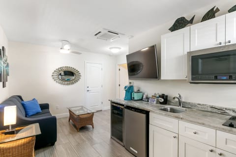 Luxury Suite, 1 Bedroom, Pool Access | Living area | Flat-screen TV