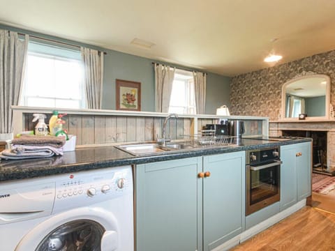 Fridge, electric kettle, cookware/dishes/utensils