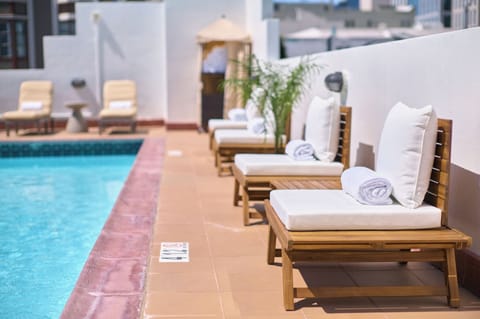 Outdoor pool, open 9:00 AM to 9:00 PM, sun loungers