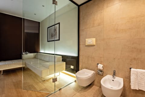 Suite | Bathroom | Hair dryer, bidet, towels, soap