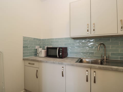 Fridge, electric kettle, toaster, cookware/dishes/utensils